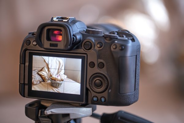 Close up of the screen of a professional digital camera on a tripod.